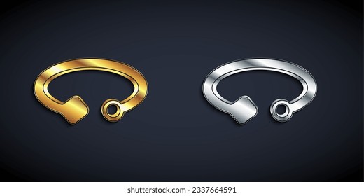 Gold and silver Bracelet jewelry icon isolated on black background. Bangle sign. Long shadow style. Vector