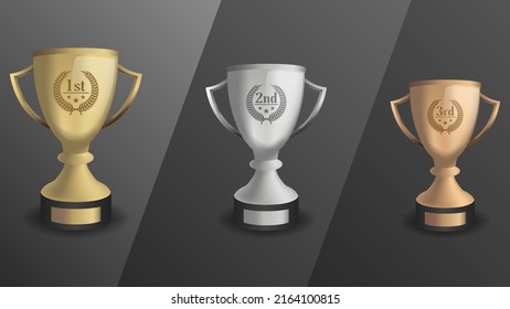 Gold, silver and bronze prize cups isolated on dark background. Prizes for first places.