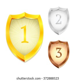Gold, silver and bronze shields. Vector.
