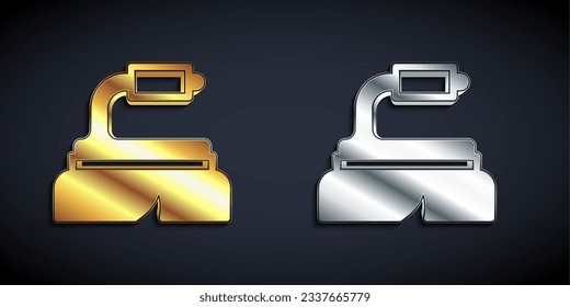 Gold and silver Brush for cleaning icon isolated on black background. Cleaning service concept. Long shadow style. Vector