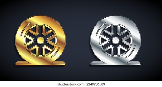 Gold and silver Car wheel icon isolated on black background. Long shadow style. Vector