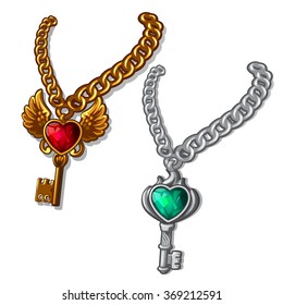 Gold and silver chain with pendant. The key with precious stone.