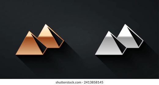 Gold and silver Egypt pyramids icon isolated on black background. Symbol of ancient Egypt. Long shadow style. Vector