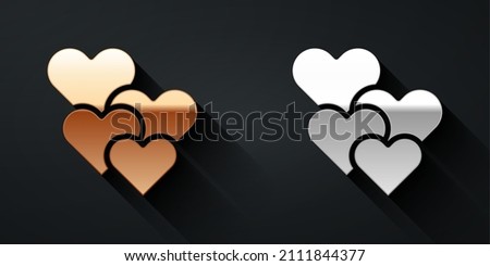 Gold and silver Heart icon isolated on black background. Romantic symbol linked, join, passion and wedding. Happy Valentines day. Long shadow style. Vector