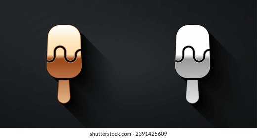 Gold and silver Ice cream on stick icon isolated on black background. Sweet symbol. Long shadow style. Vector