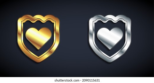 Gold and silver Immune system icon isolated on black background. Medical shield. Long shadow style. Vector