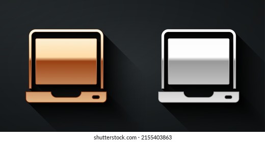 Gold and silver Laptop icon isolated on black background. Computer notebook with empty screen sign. Long shadow style. Vector