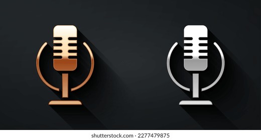 Gold and silver Microphone icon isolated on black background. On air radio mic microphone. Speaker sign. Long shadow style. Vector