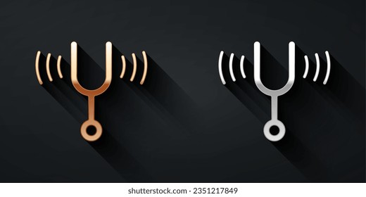 Gold and silver Musical tuning fork for tuning musical instruments icon isolated on black background. Long shadow style. Vector