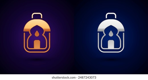 Gold and silver Ramadan Kareem lantern icon isolated on black background.  Vector