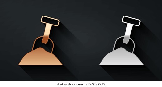 Gold and silver Sandbox with sand and shovel icon isolated on black background. Long shadow style. Vector