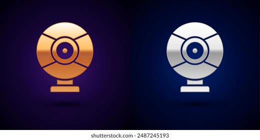 Gold and silver Security camera icon isolated on black background.  Vector