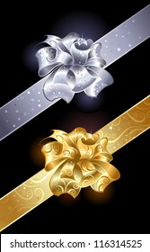 gold and silver, shiny bow on a dark background.