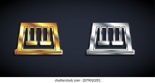 Gold and silver Swings for kids summer games on playground icon isolated on black background. Outdoor entertainment equipment. Long shadow style. Vector