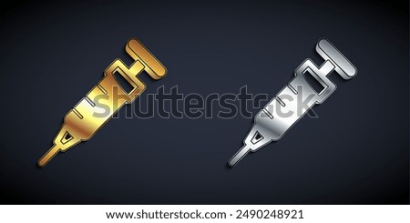 Gold and silver Syringe icon isolated on black background. Syringe for vaccine, vaccination, injection, flu shot. Medical equipment. Long shadow style. Vector