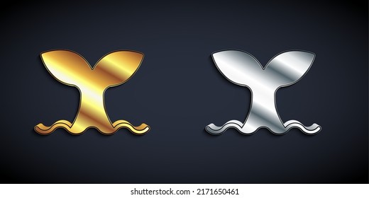 Cola de ballena dorada y plateada en icono de ola oceánica aislada en fondo negro. Estilo de sombra larga. Vector
