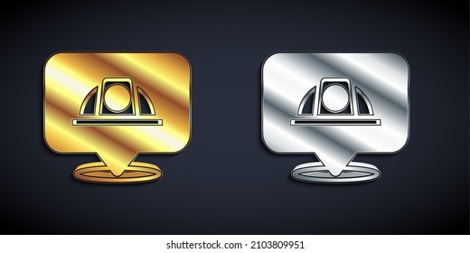 Gold and silver Worker safety helmet icon isolated on black background. Long shadow style. Vector