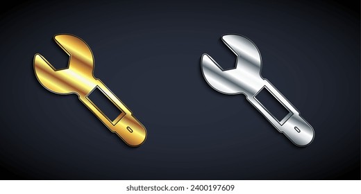 Gold and silver Wrench spanner icon isolated on black background. Spanner repair tool. Service tool symbol. Long shadow style. Vector