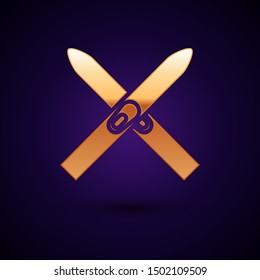 Gold Ski and sticks icon isolated on dark blue background. Extreme sport. Skiing equipment. Winter sports icon.  Vector Illustration