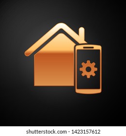 Gold Smart home - remote control system icon isolated on black background. Vector Illustration