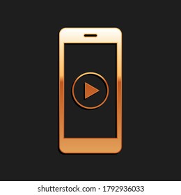 Goldenes Smartphone mit Play-Taste auf dem Bildschirm Symbol einzeln auf schwarzem Hintergrund. Lange Schattenstil. Vektorgrafik