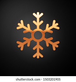 Gold Snowflake icon isolated on black background.  Vector Illustration