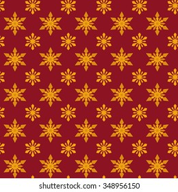 Gold snowflakes for Christmas. Red background packing. 