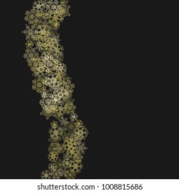Gold snowflakes frame on black background. New year theme. Stylish shiny Christmas frame for holiday banner, card, sales, special offers. Falling snow with gold snowflakes and glitter for party invite