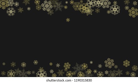 Gold snowflakes frame on black background. New year theme. Horizontal shiny Christmas frame for holiday banner, card, sale, special offer. Falling snow with gold snowflake and glitter for party invite