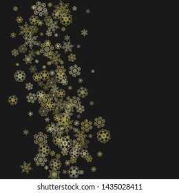 Gold snowflakes frame on black background. New year theme. Stylish shiny Christmas frame for holiday banner, card, sales, special offers. Falling snow with gold snowflakes and glitter for party invite