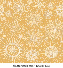 Gold snowflakes pattern. Golden snow flake vector seamless wallpapers.