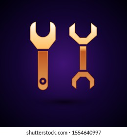 Gold Spanner icon isolated on dark blue background.  Vector Illustration