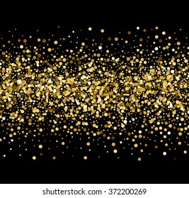 Gold sparkles on black background. Gold glitter background. 