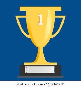 Gold sports trophy cup or first place award for event with blank name plate on pedestal