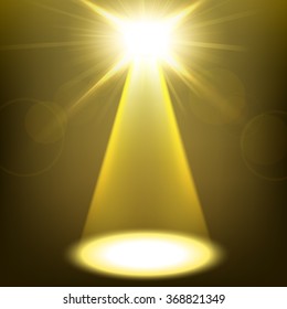 Gold spotlight shining