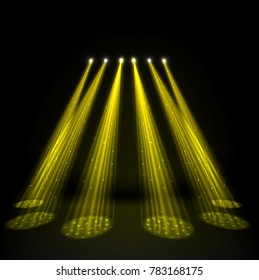 Gold spotlights on dark background