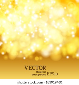 Gold spring or summer background. abstract with bokeh defocused lights