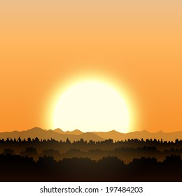 Gold sunset with forest and mountains
