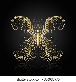 Gold swirl pattern in shape of a butterfly on dark background with reflection.