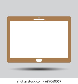 gold tablet on gray background