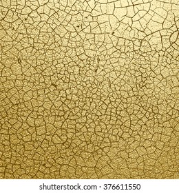 Gold texture with cracks.Abstract gold background. Metal texture. Golden glitter texture. Vector mode.