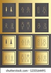 Gold toilet sign on dark wall.Big metallic sign for give information about a way to toilet.Various set modern toilet sign for setup on the wall at company or store