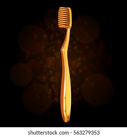 Gold toothbrush on a black background with sparkles