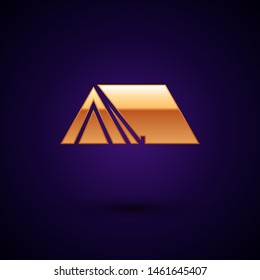 Gold Tourist tent icon isolated on dark blue background. Camping symbol.  Vector Illustration
