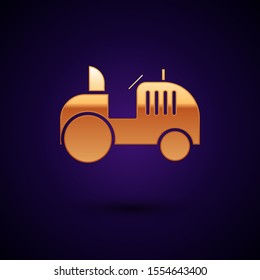 Gold Tractor icon isolated on dark blue background.  Vector Illustration