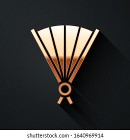 Gold Traditional paper chinese or japanese folding fan icon isolated on black background. Long shadow style. Vector Illustration