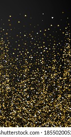 Gold triangles luxury sparkling confetti. Scattered small gold particles on black background. Enchanting festive overlay template. Likable vector background.