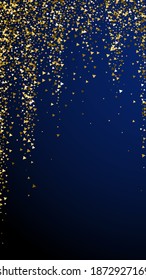 Gold triangles luxury sparkling confetti. Scattered small gold particles on dark blue background. Eminent festive overlay template. Grand vector background.