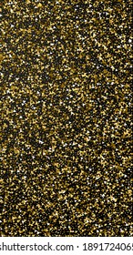 Gold triangles luxury sparkling confetti. Scattered small gold particles on black background. Exceptional festive overlay template. Breathtaking vector background.