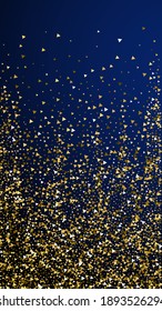 Gold triangles luxury sparkling confetti. Scattered small gold particles on dark blue background. Enchanting festive overlay template. Lively vector background.